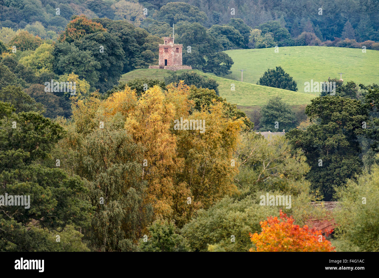 Cumbria, UK.17th October, 2015. The unique 19th century unattached bell tower of St Oswald's Church, Kirkoswald in Cumbria stands above the Autumnal colours of the Eden Valley: 17 October 2015   Credit:  STUART WALKER/Alamy Live News Stock Photo