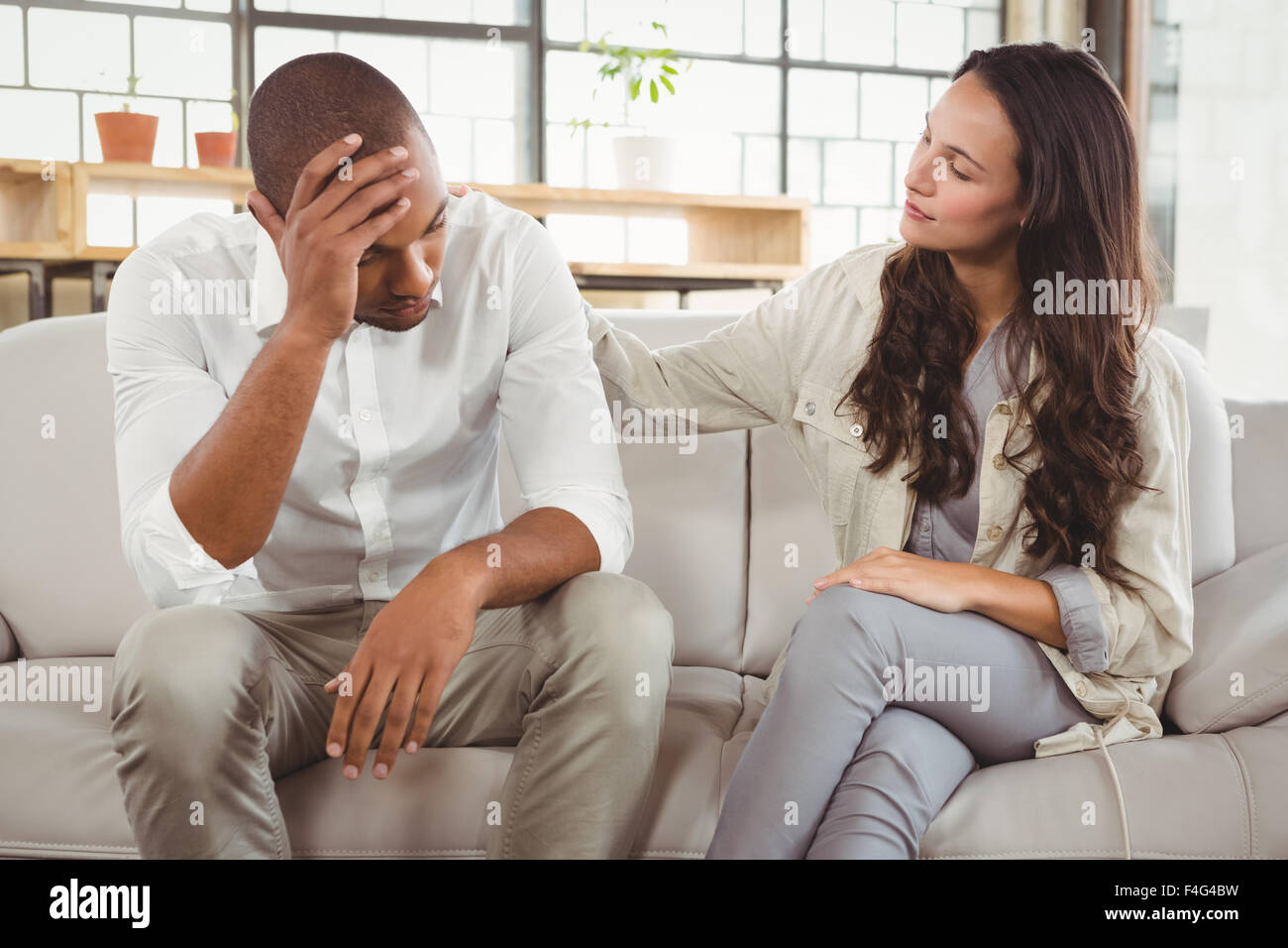 Therapist counselling depressed patient Stock Photo