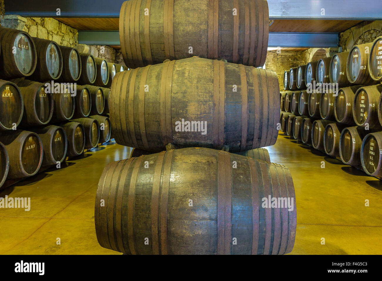 Port wine barrels stack in the lodge cellar. September, 2015. Porto, Portugal. Stock Photo