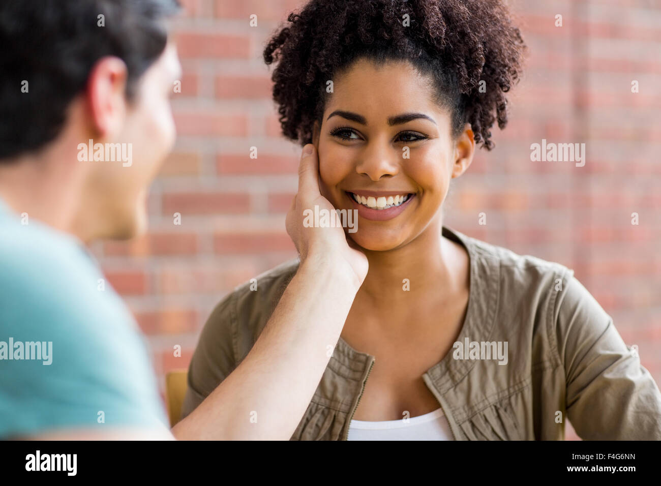 Students flirting in the cafe Stock Photo - Alamy
