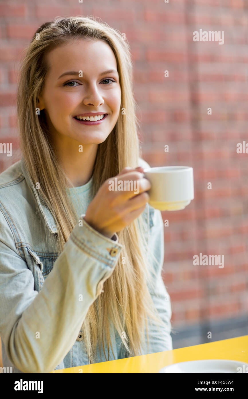 Pretty student having a coffee Stock Photo