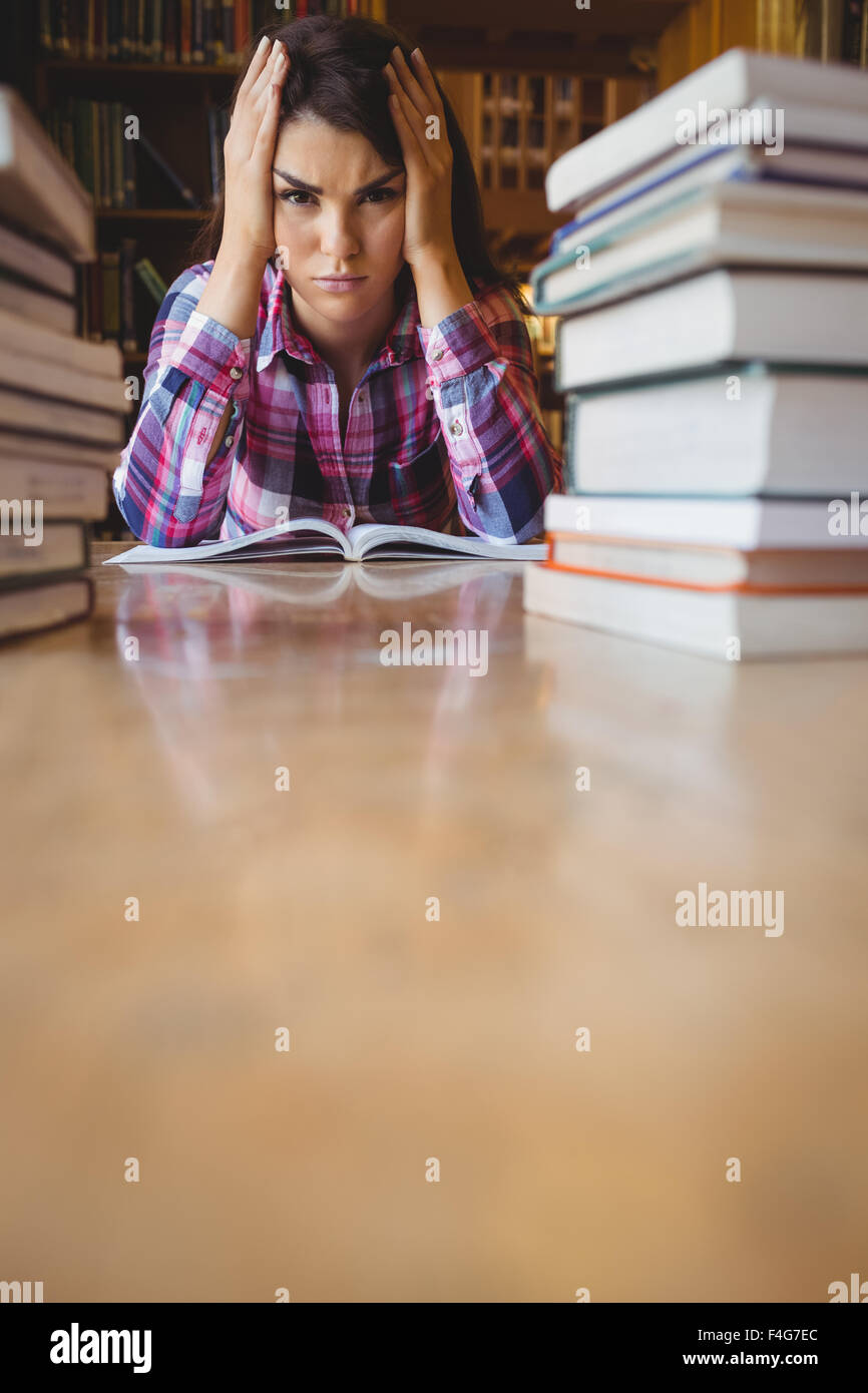 Portrait of frustrated female student Stock Photo