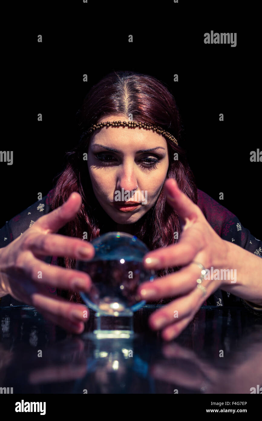 Fortune teller woman using crystal ball Stock Photo Alamy