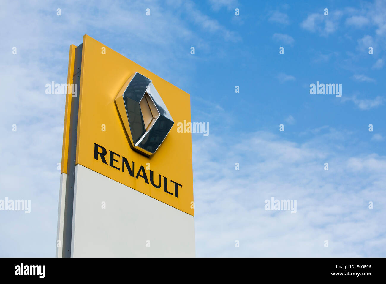 A logo sign outside of an Renault vehicle dealership in Amsterdam, Netherlands on October 3, 2015. Stock Photo