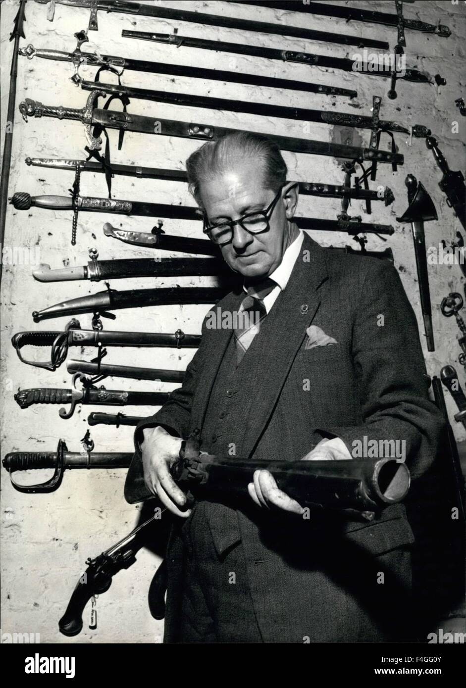 Feb. 24, 1968 - Armourer to the Royal Opera House Custodian of the famous arms collection at Covent Garden is Cyril Brasher, 58-year old former army and Colonial Service officer. He is holding the blunderbuss, which weighs 18 lbs and has a muzzle 1&frac34; wide. On the wall behind is a Danish XVIII century pistol, and above it are seven real officers swords, topped by a Cossack with ivory hilt. Above these are various theatrical swords and the famous Lohengrin sword. © Keystone Pictures USA/ZUMAPRESS.com/Alamy Live News Stock Photo