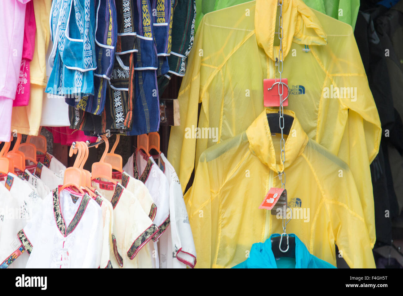 Sapa or Sa Pa is a frontier town in north west Vietnam, shots here in the rainy wet season with plastic jackets for sale Stock Photo