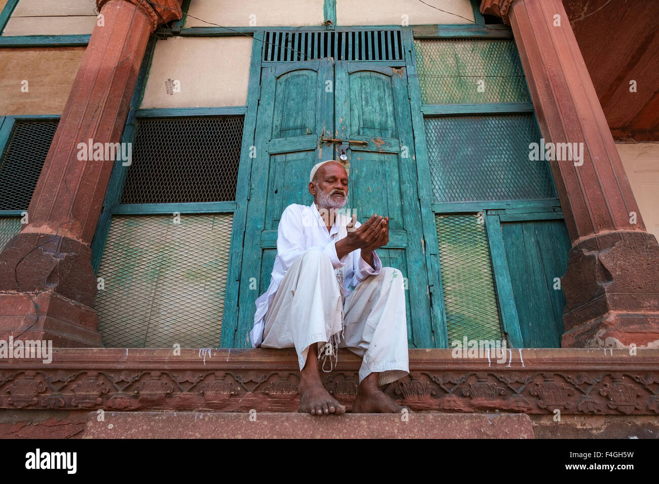 Gate keeper at Jamma Mosque Agra. The mosque is very popular among tourist after Taj Mahal. Stock Photo