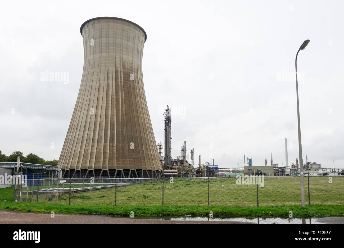 Part of industrial chemical complex, with Cooling tower at chemical factory, DSM. Geleen, Limburg, Netherlands. Stock Photo