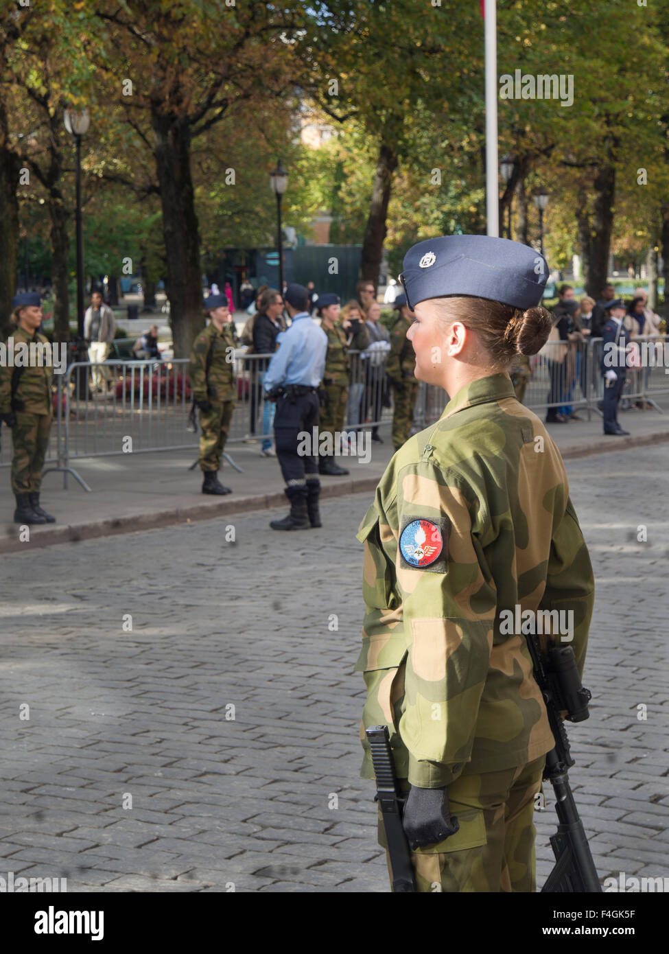 Female soldier from the Norwegian air force guarding a parade in Karl Johan street Oslo Norway Stock Photo