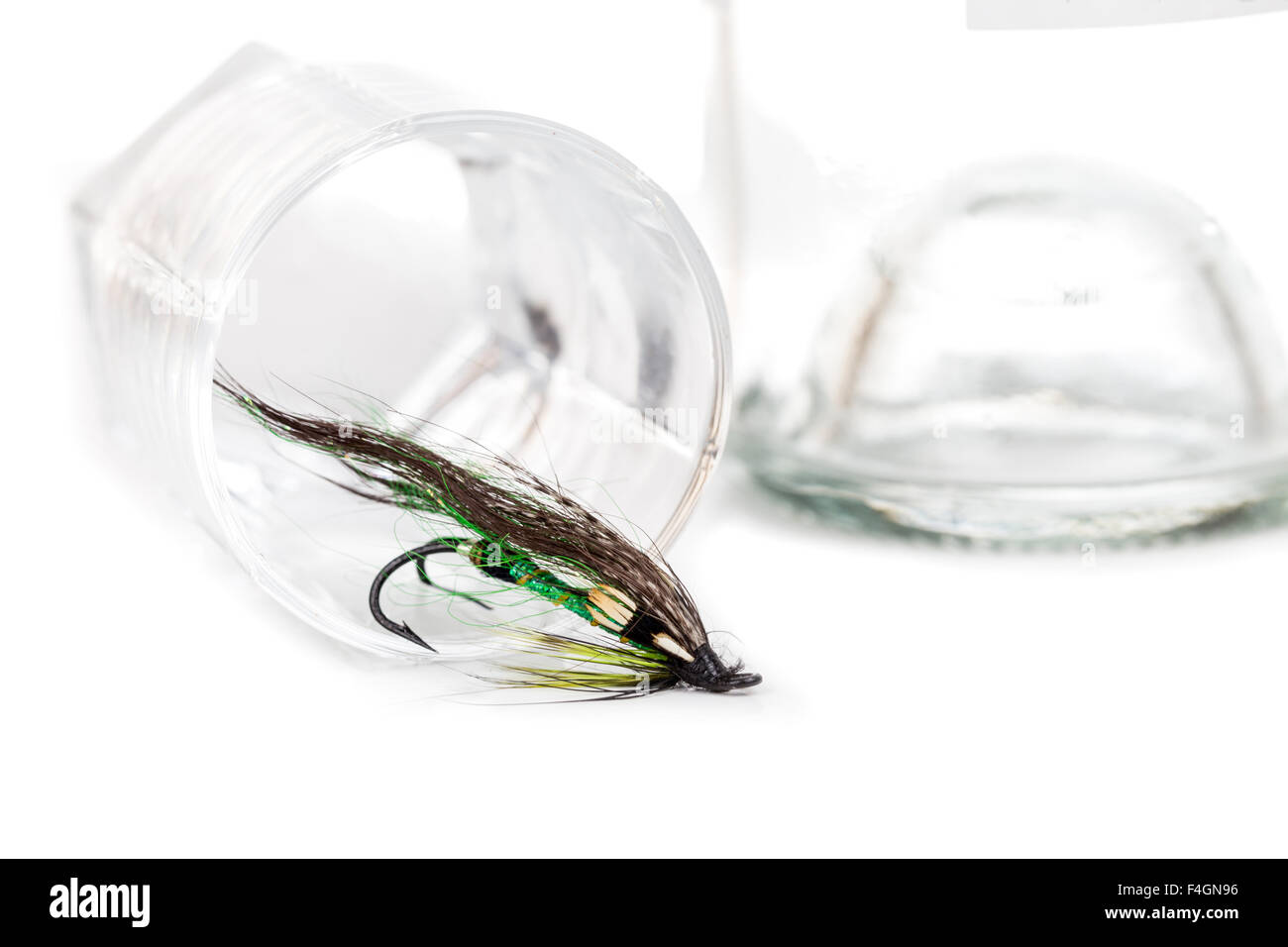 fly fishing bait with glass and bottle with white alcohol Stock Photo - Alamy fly fishing bait with glass and bottle with white alcohol Stock Photo - Alamy