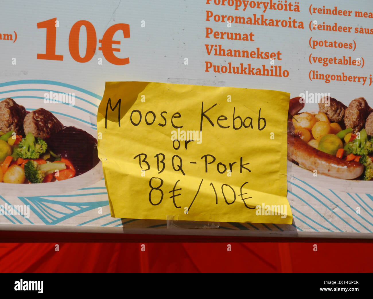 A post it note on a menu in Helsinki, Finland advertising Moose kebabs Stock Photo