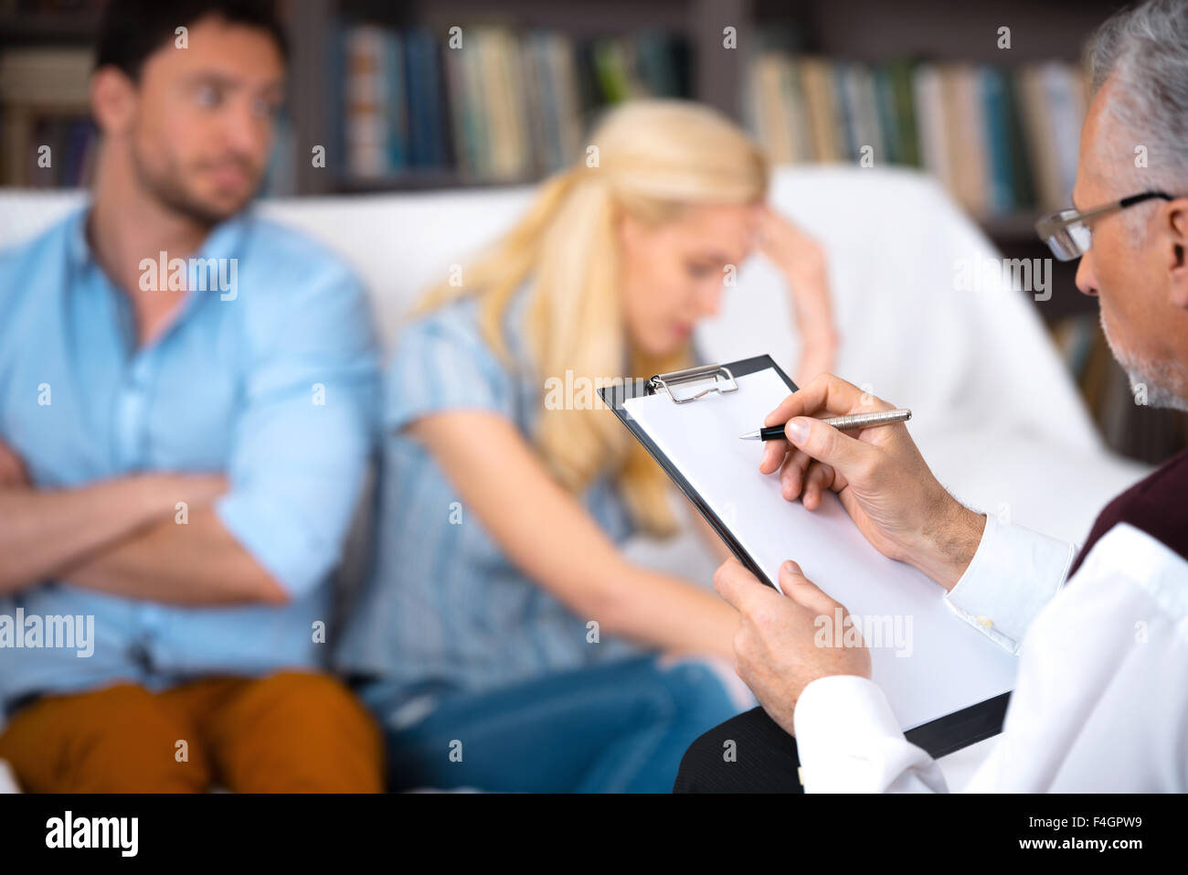 Sad Unhappy Young Couple Talking With Psychologist Psychologist Taking