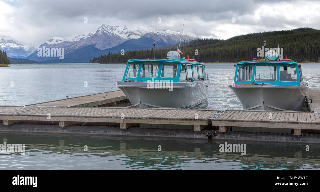 Moored tour boats on Maligne Lake in Jasper National Park, Rocky Mountains, Alberta, Canada. Stock Photo