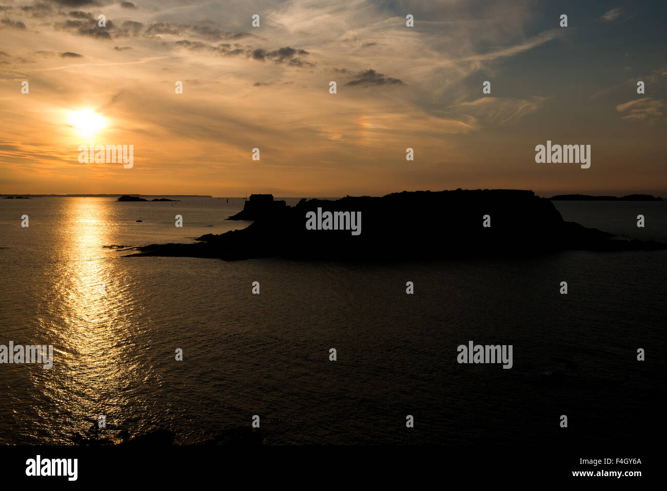 Beach and islands on the coast of St Malo, France at dusk Stock Photo