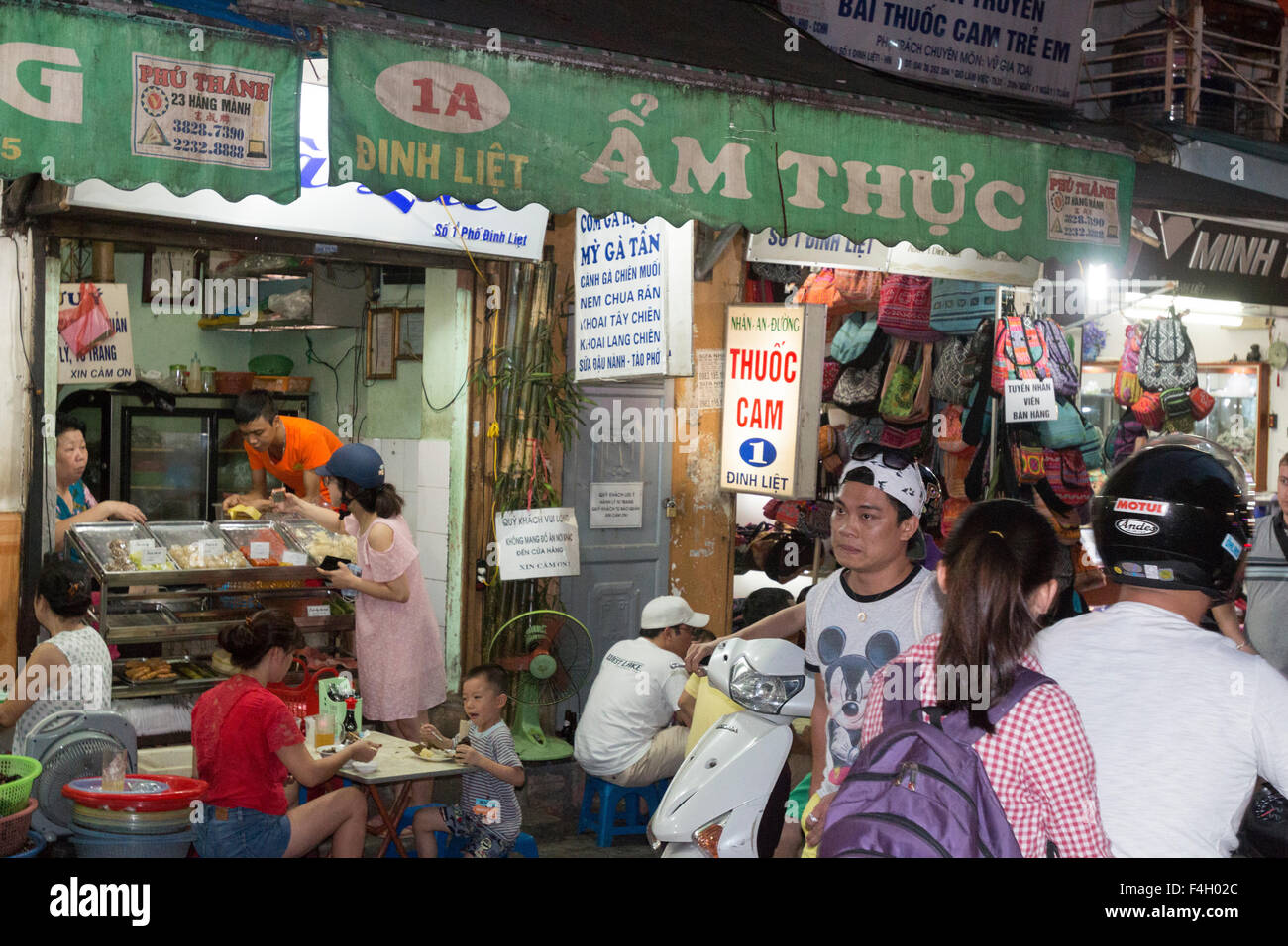 Restaurant cafe serving street food in Hanoi old quarter, traditional vietnamese style,Vietnam, Asia Stock Photo