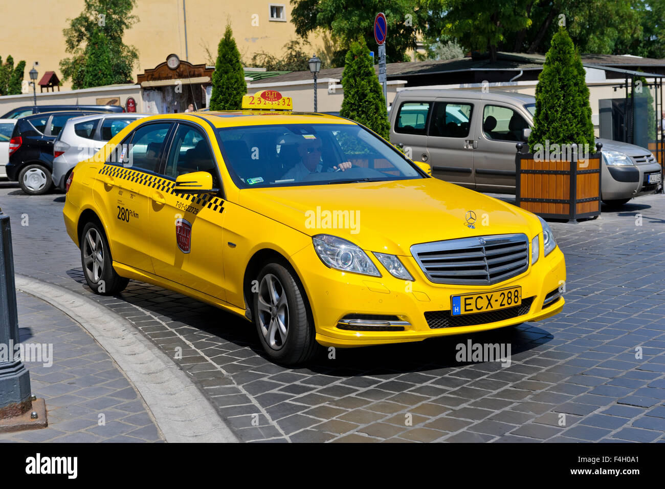 A typical Yellow Taxi in Budapest, Hungary Stock Photo Alamy