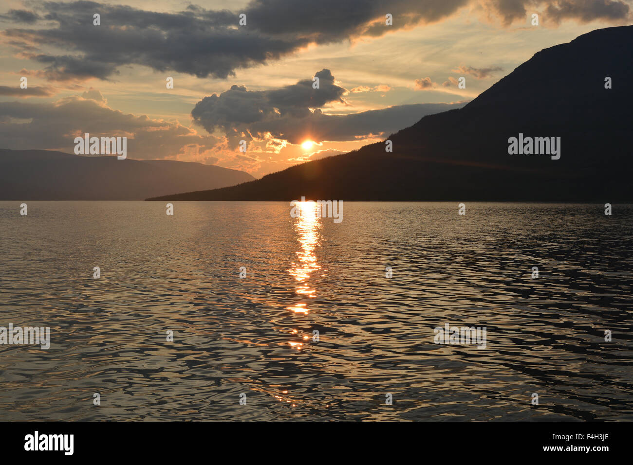 Tranquil lake sunset reflects hi-res stock photography and images - Alamy