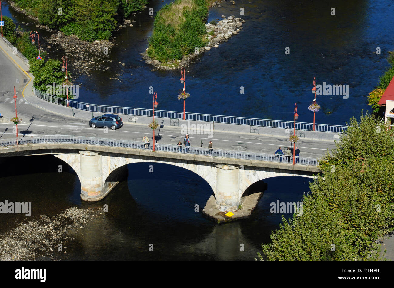Road bridge over the River Ariege in the town of Tarascon, Ariege, Midi-Pyrenees, France Stock Photo