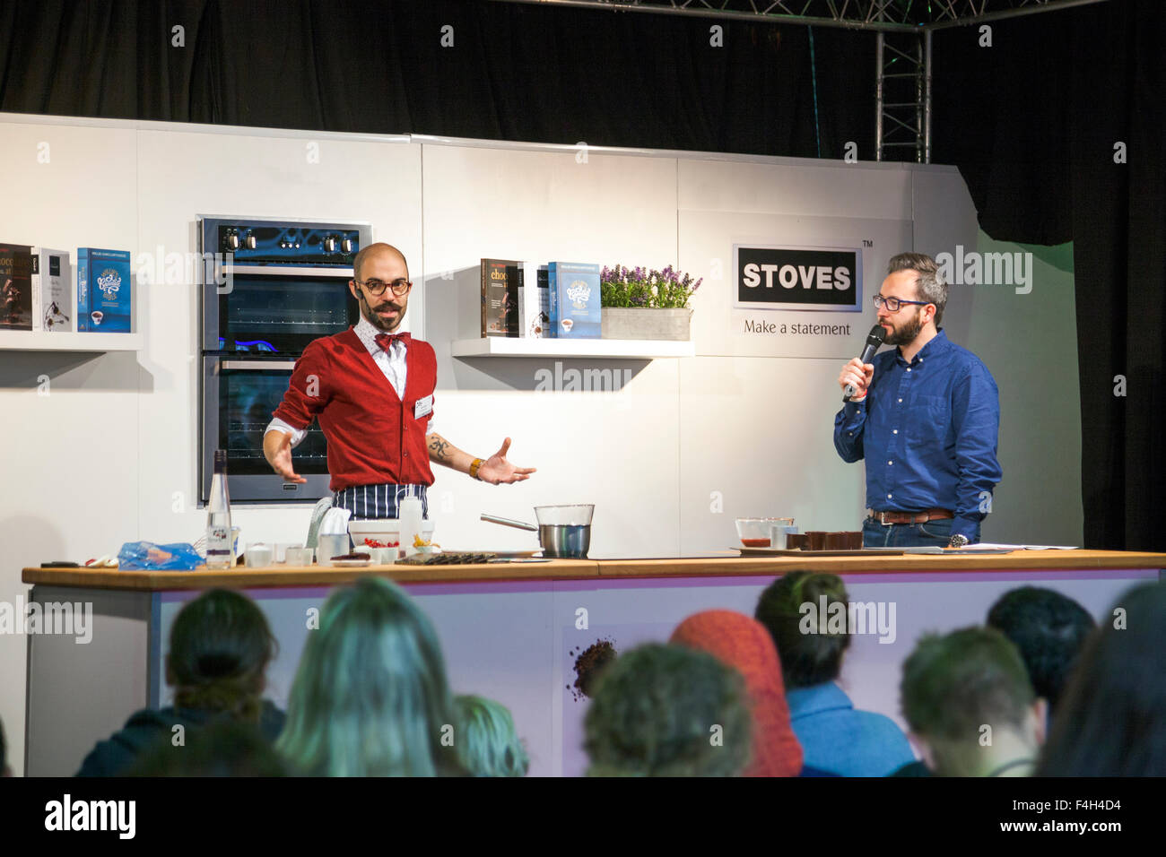 London, UK. 18th October 2015 - Tony Rodd, Masterchef finalist, creating a Black Forest dessert in front of live audience. International specialists from the chocolate industry gather at Olympia Hall to exhibit at the annual Chocolate Show in London, UK’s largest chocolate event. Activities include workshops, presentations by famous chefs, demonstrations and a chocolate fashion show. Credit: Nathaniel Noir/Alamy Live News Stock Photo