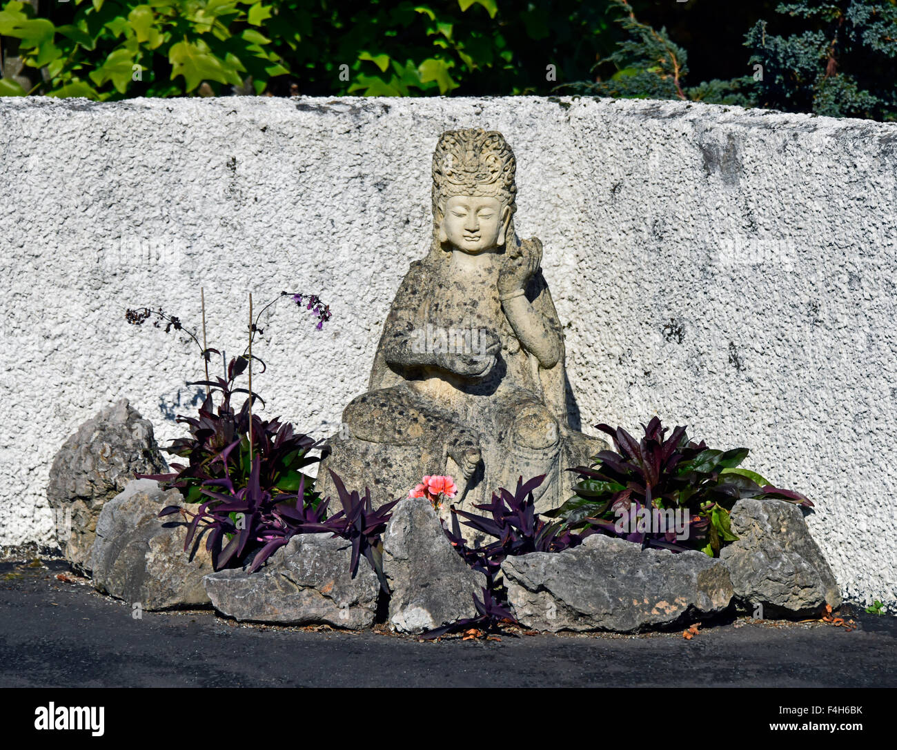 Garden Buddha. Windermere Road, Kendal, Cumbria, England, United Kingdom, Europe. Stock Photo