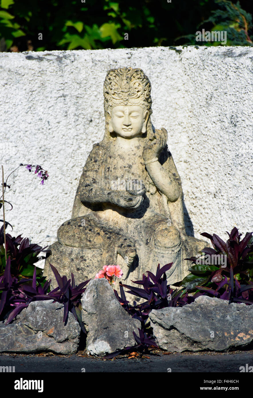 Garden Buddha. Windermere Road, Kendal, Cumbria, England, United Kingdom, Europe. Stock Photo