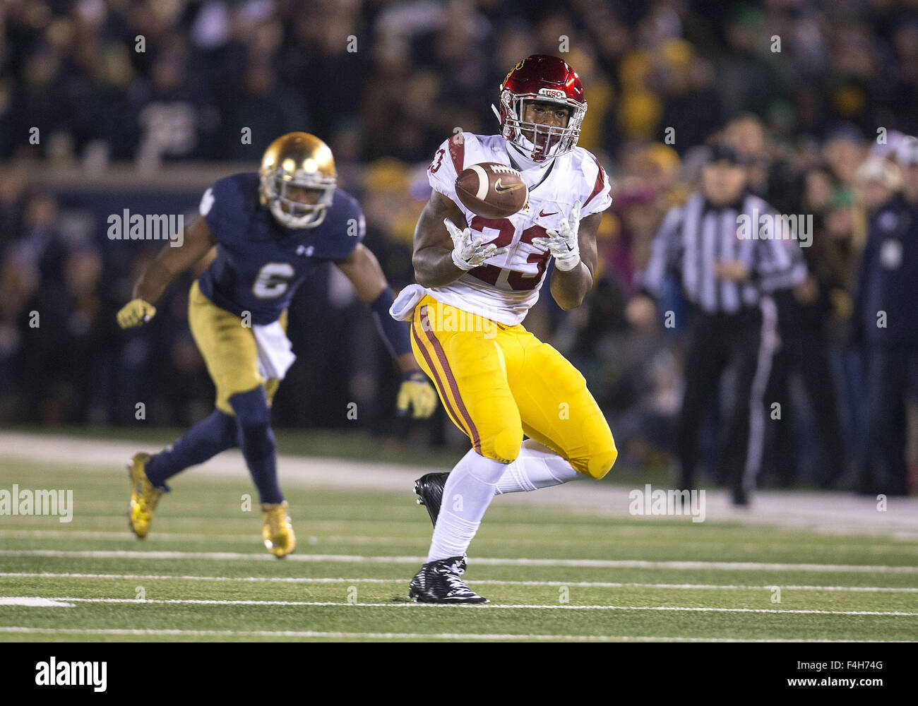 South Bend, Indiana, USA. 17th Oct, 2015. USC running back Tre Madden (23) catches the ball during NCAA football game action between the USC Trojans and the Notre Dame Fighting Irish at Notre Dame Stadium in South Bend, Indiana. Notre Dame defeated USC 41-31. John Mersits/CSM. © csm/Alamy Live News Stock Photo