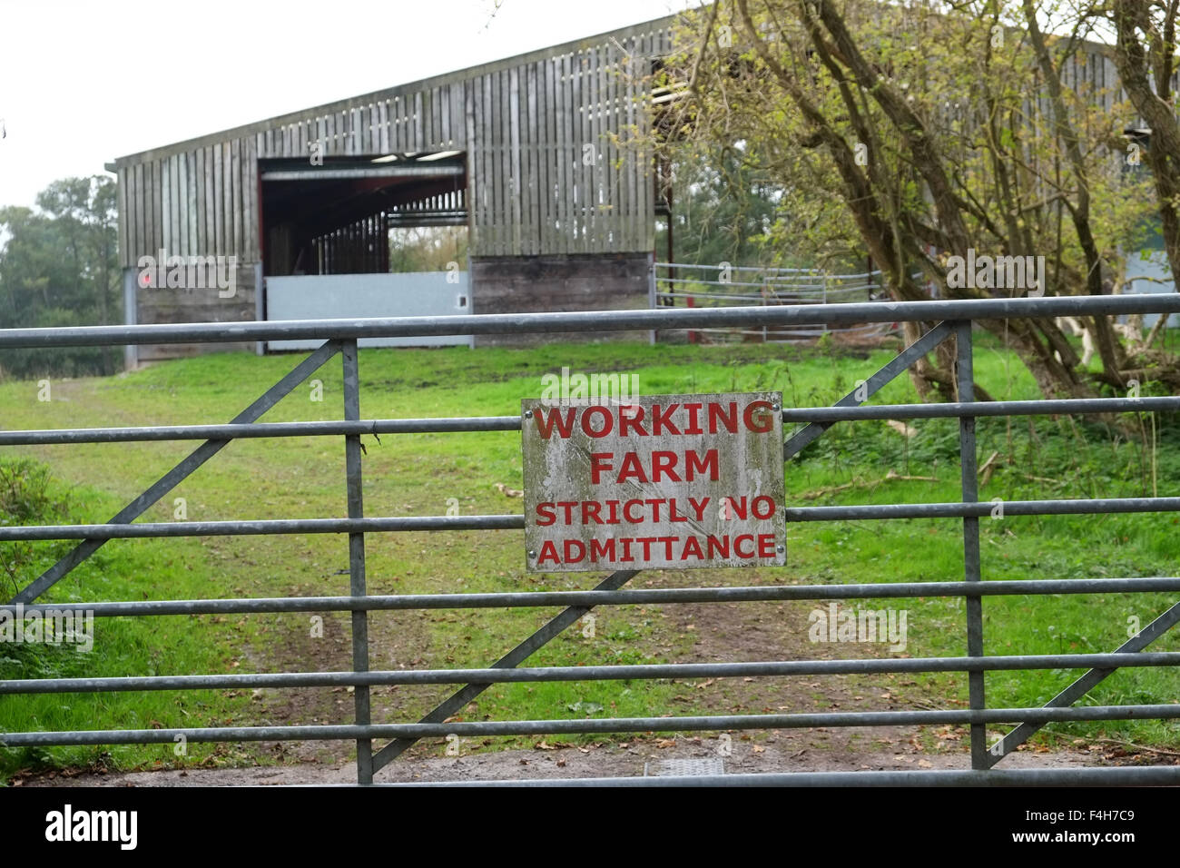 Sign for working farm, strictly no admittance on gate in rural Somerset, England. October 2015 Stock Photo
