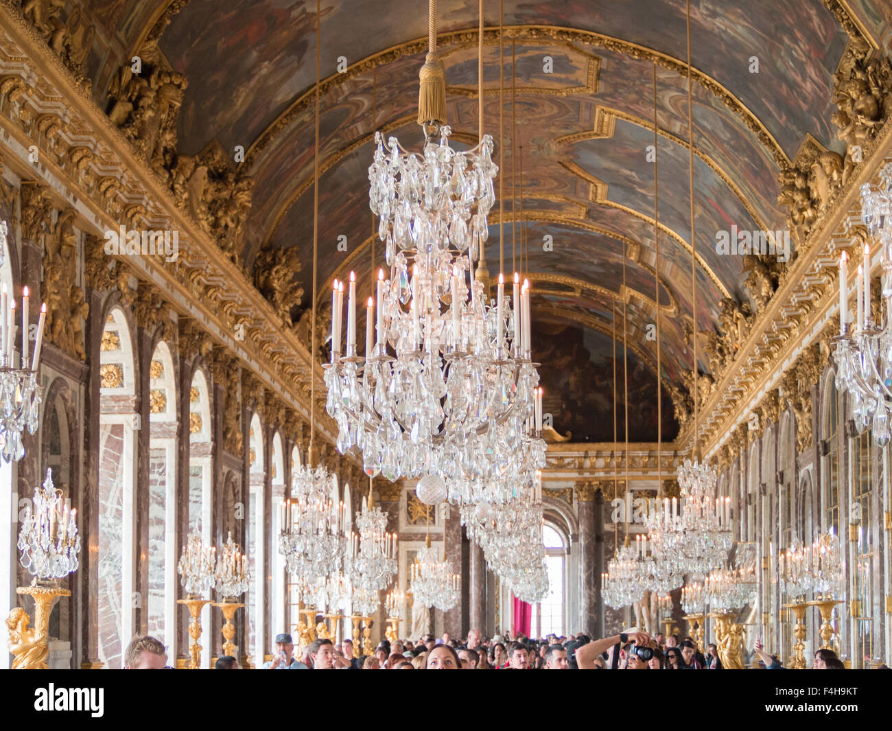 Under the chandeliers of the Versailles Palace Mirror Room Stock Photo