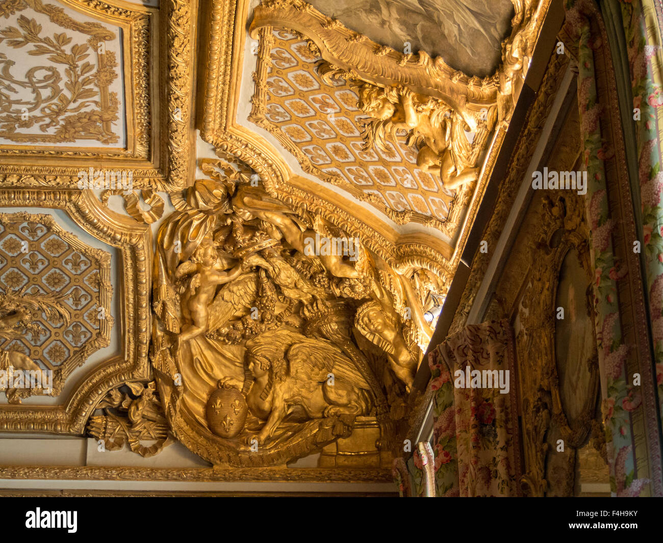 Golden ceiling corner detail from Versailles Palace interior rooms ...