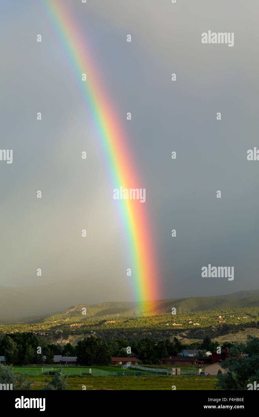 Rainbow over the small mountain town of Salida, Colorado, USA Stock Photo