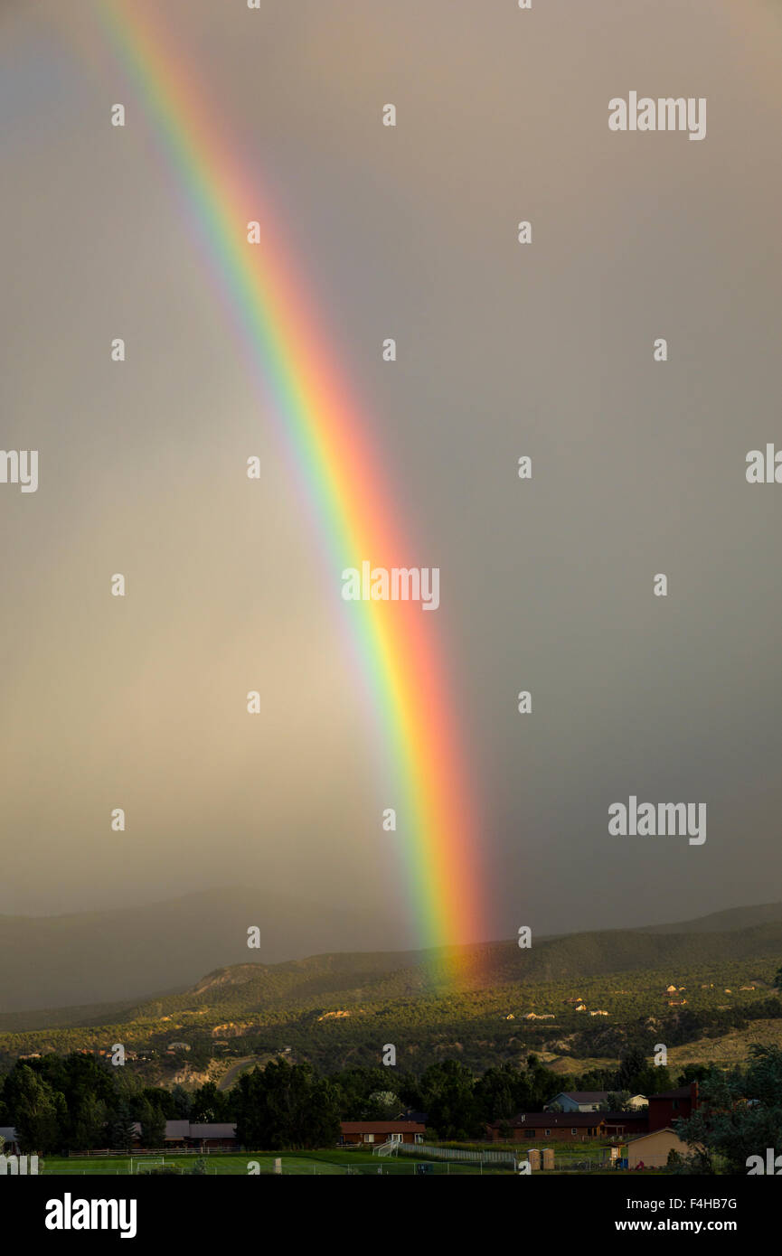 Rainbow over the small mountain town of Salida, Colorado, USA Stock Photo