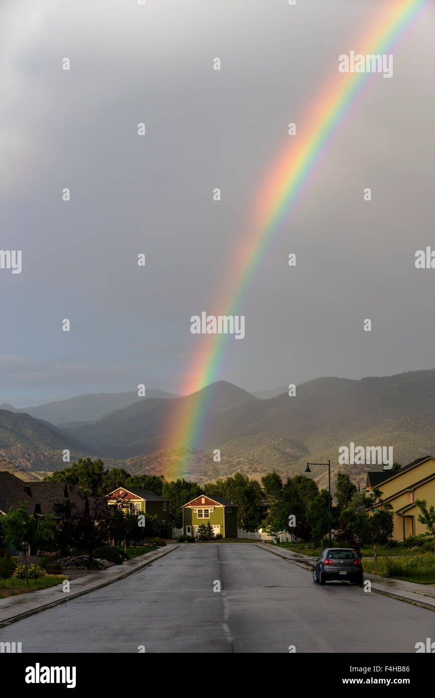 Rainbow over the small mountain town of Salida, Colorado, USA Stock Photo