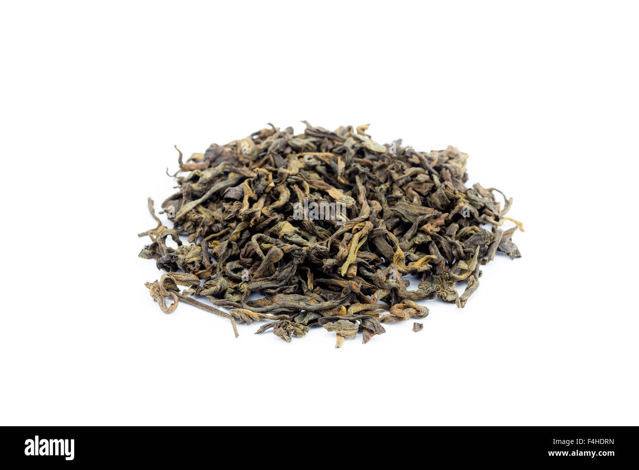 Pile of loose tea Pu Erh isolated on white background Stock Photo