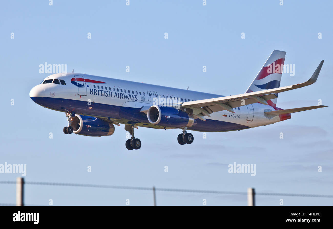 British Airways Airbus a320 G-EUYS coming into land at London Heathrow Airport LHR Stock Photo