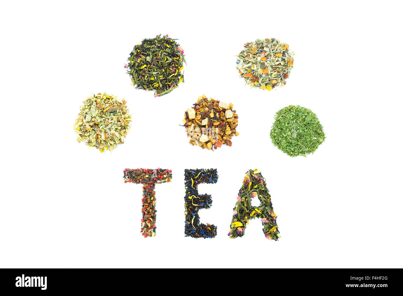 Word TEA with letters made of different tea species isolated on white background Stock Photo