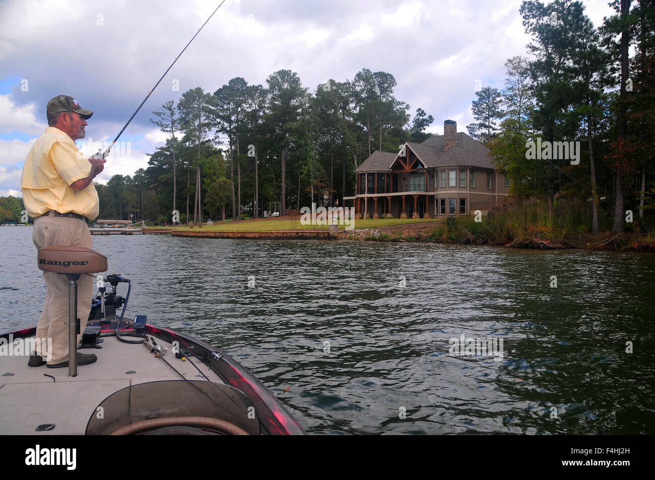 An angler/guide tosses soft plastic baits for largemouth on