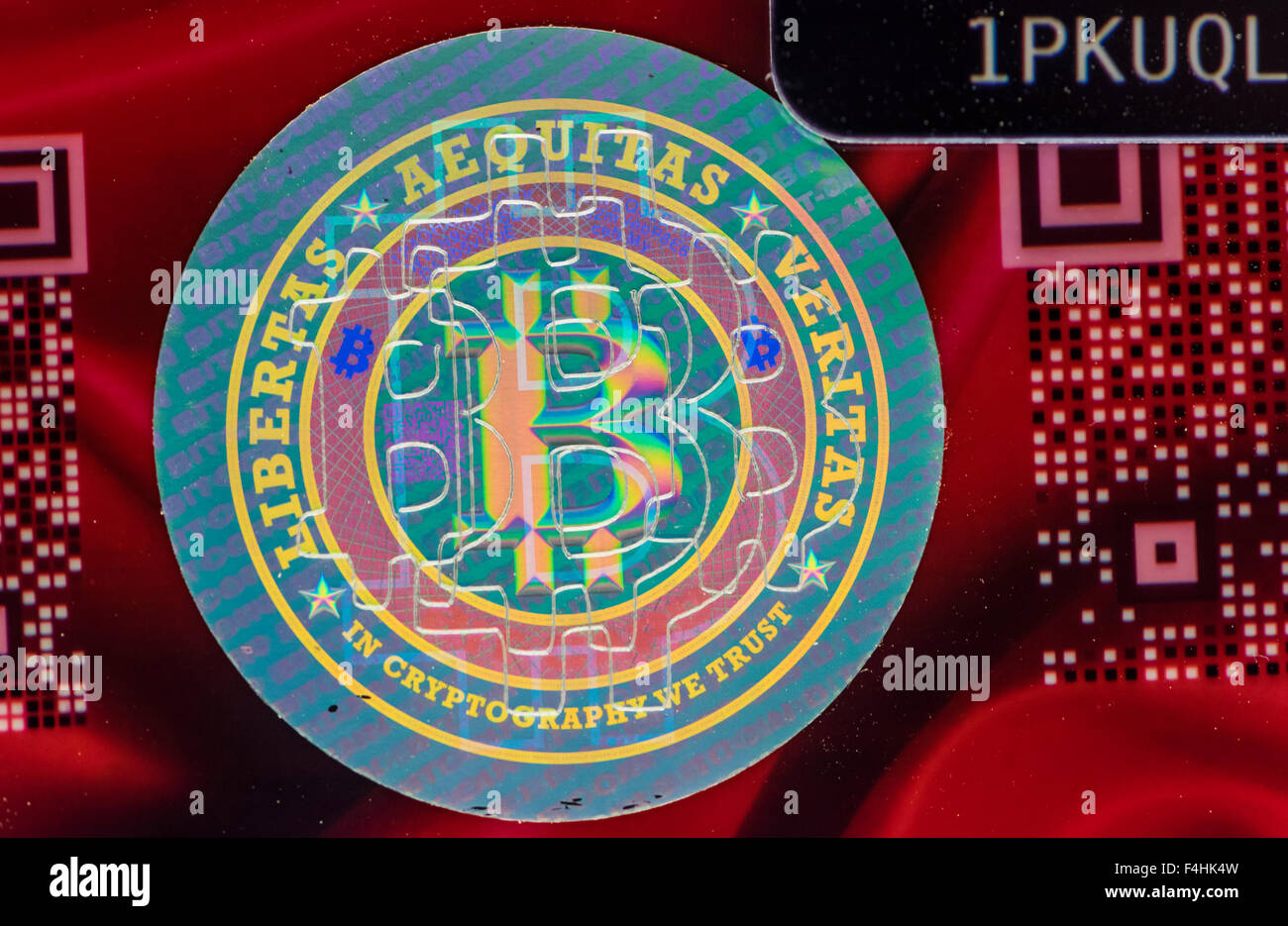 Close-up of the hologram on the back of a physical Bitcoin wallet card  Stock Photo - Alamy