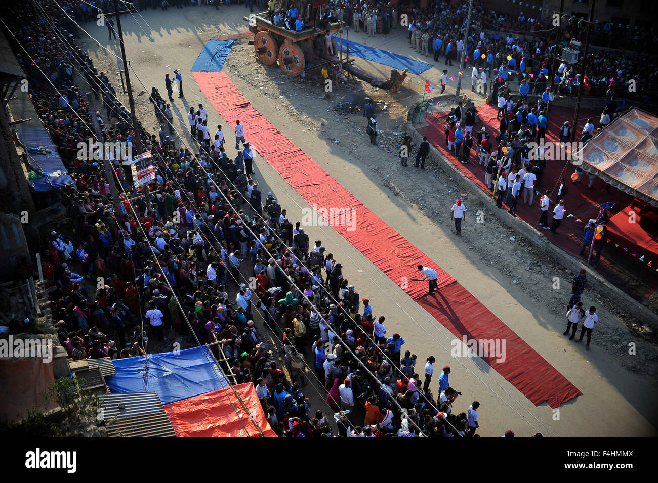 Kathmandu, Nepal. 18th Oct, 2015. A Nepalese worker cleaning the Red
