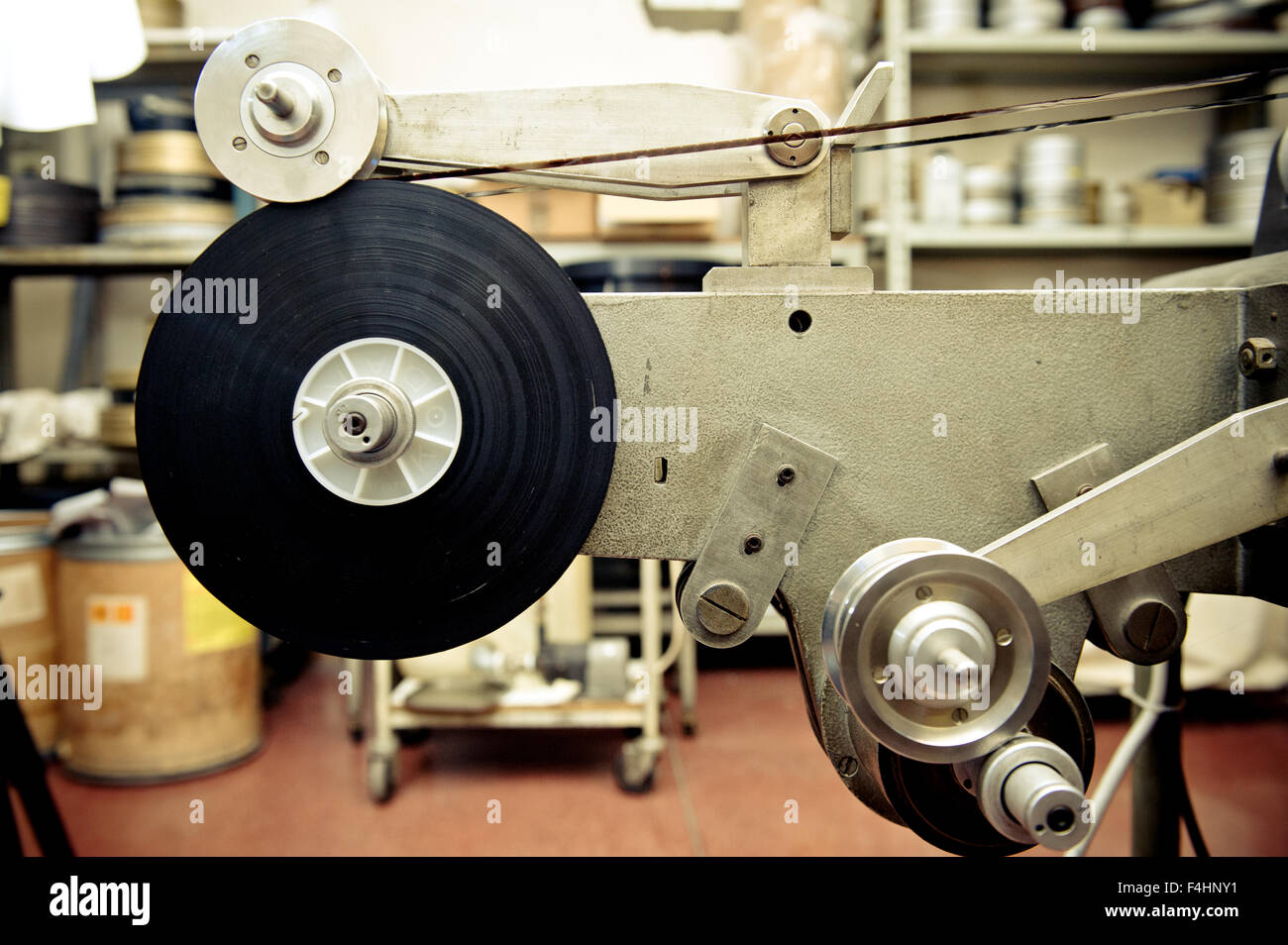 Audio video industrial film synchronizer for movie post production in old factory, vintage movie processing Stock Photo