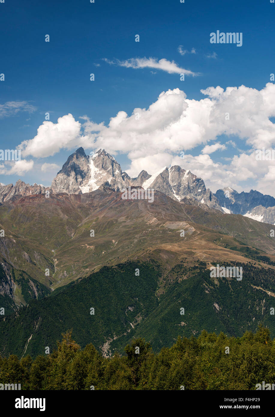 The twin peaks of Mount Ushba (4710m) in the Svaneti region of the Caucasus mountains in northwestern Georgia. Stock Photo