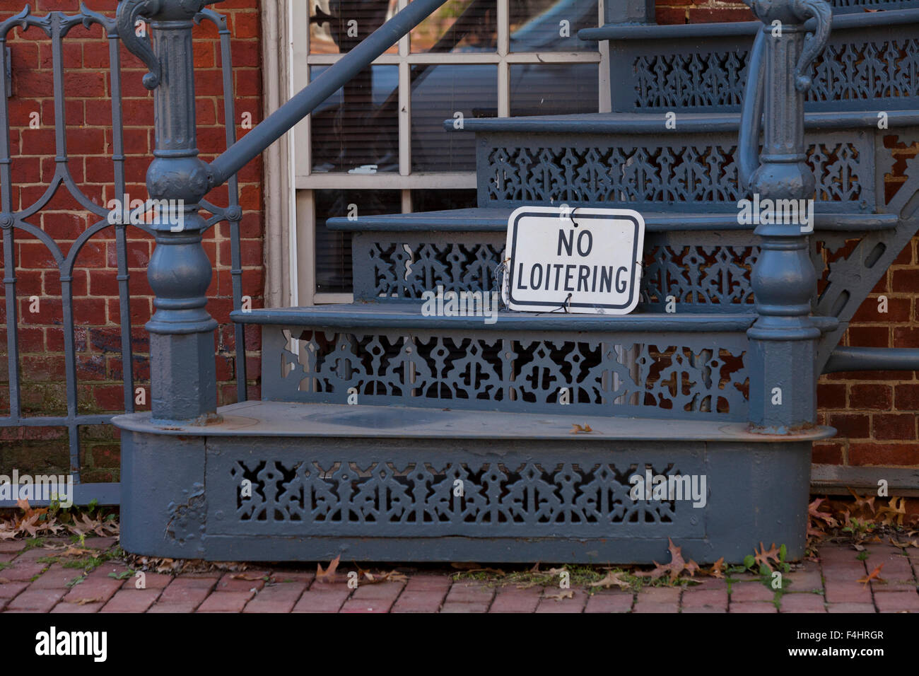 No Loitering sign on residential entrance stairway - USA Stock Photo