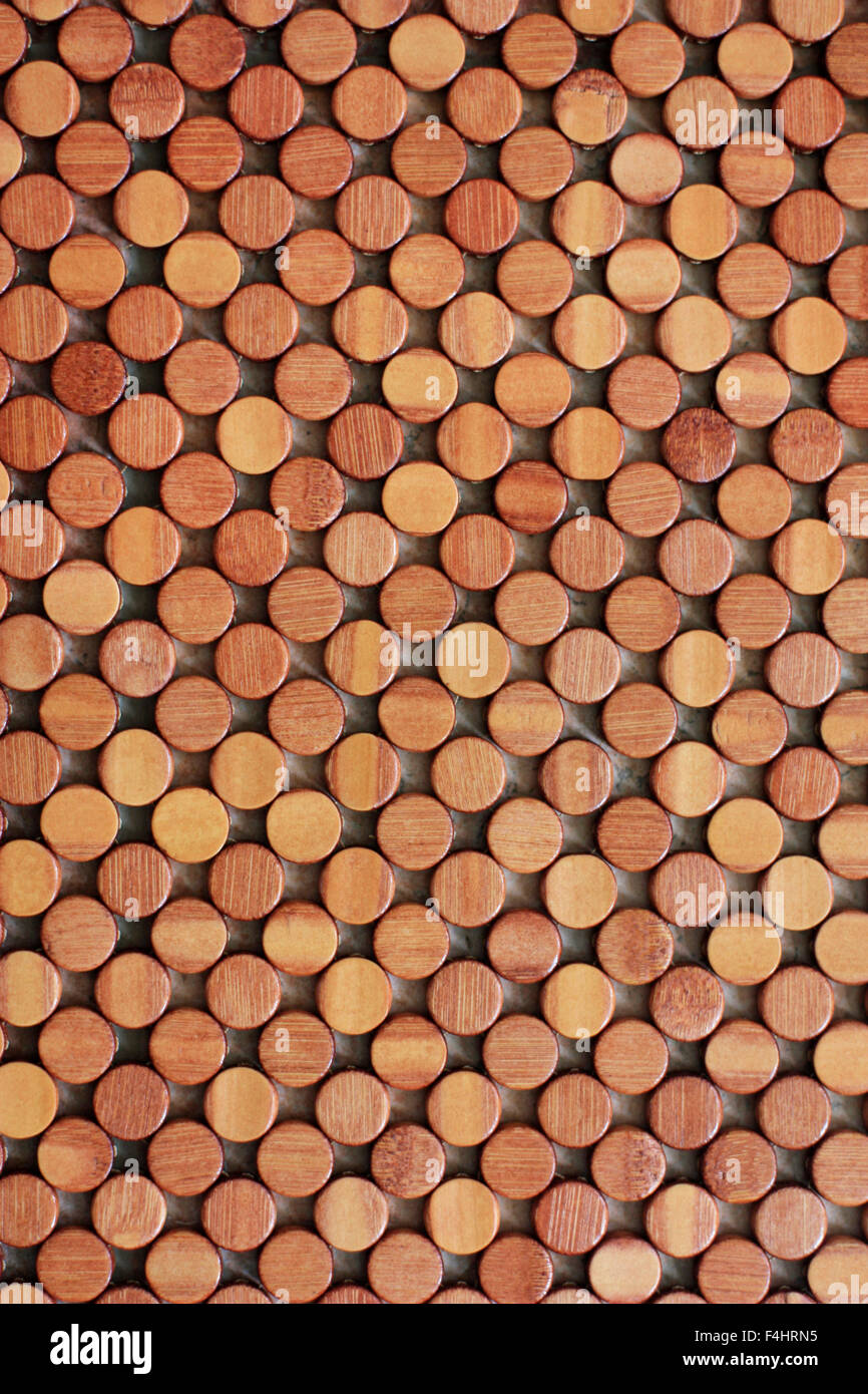 a place-mat made from wooden dots Stock Photo