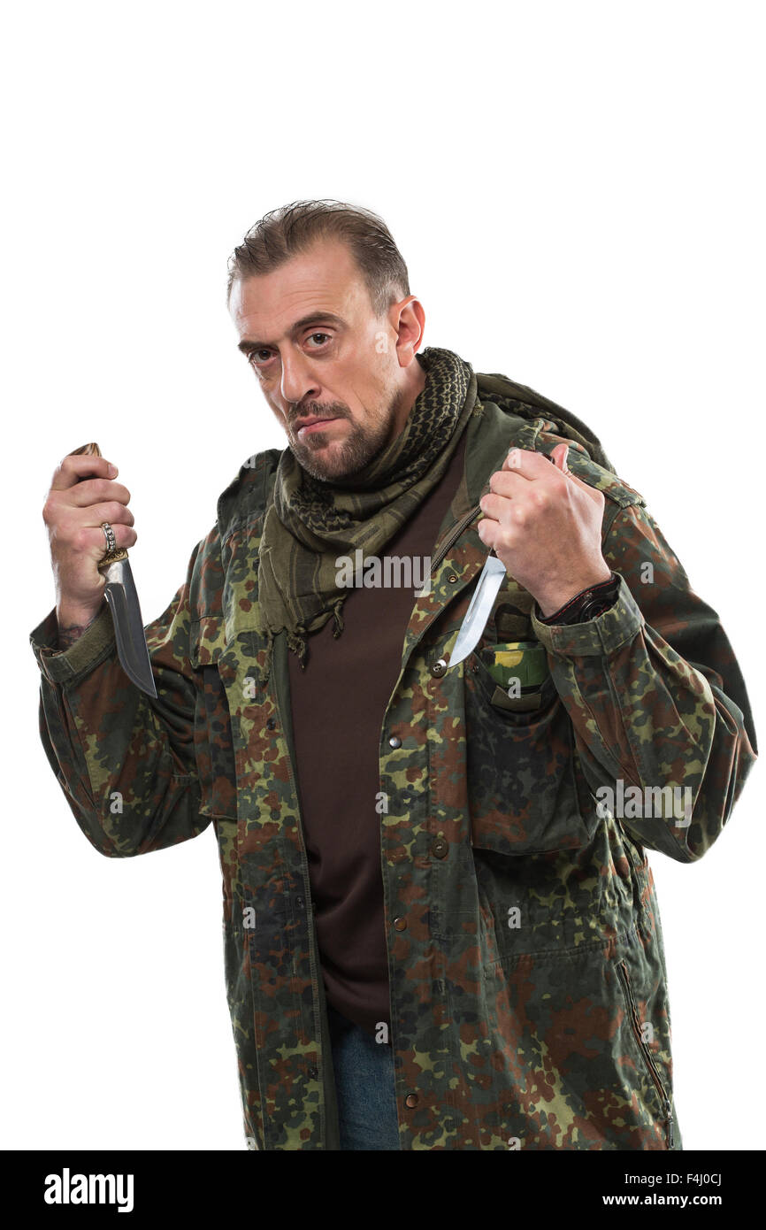 adult man in soldier uniform holding knife Stock Photo Alamy