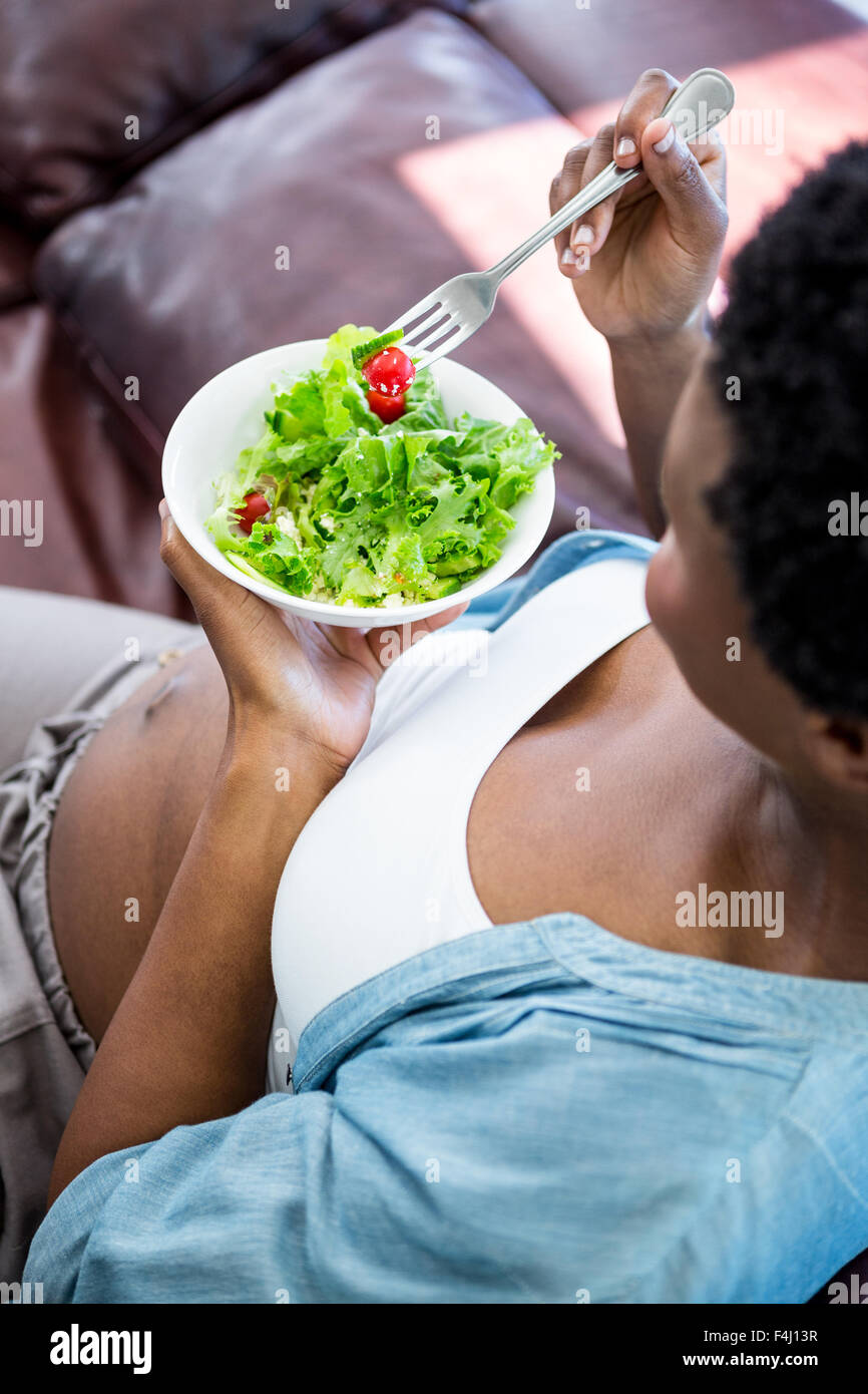 Pregnant woman enjoying a healthy salad Stock Photo Alamy