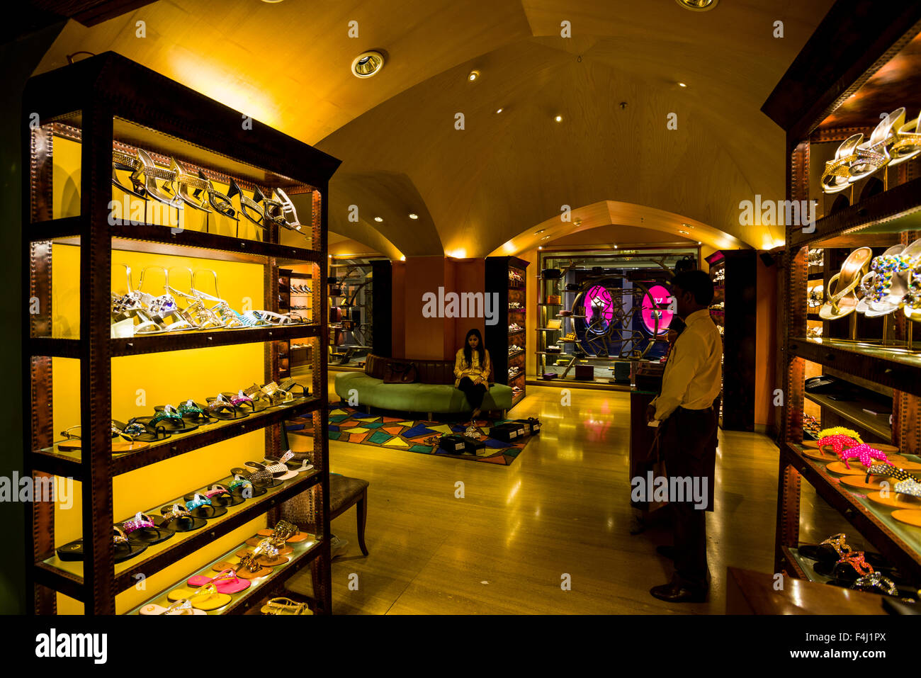 A modern and expensive shoe shop inside a new shopping mall a favored place for middle class Indians to spend time with shoppin Stock Photo Alamy
