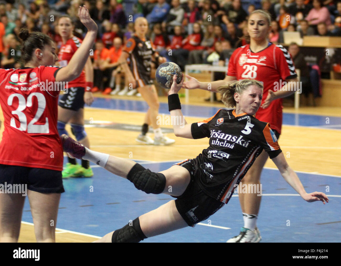 Most, Czech Republic. 17th Oct, 2015. Katerina Dvorakova (centre) of Most, Alessandra Bassanese (left) and Ana Avram of Magnago in action during the EHF European Cup qualification match Banik Most vs Cassano Magnago, Most, Czech Republic, October 17, 2015. © Ondrej Hajek/CTK Photo/Alamy Live News Stock Photo
