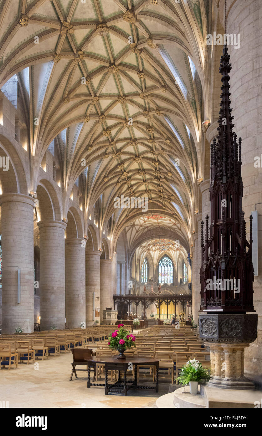 Interior looking East and font, Tewkesbury Abbey, Gloucestershire, England, United Kingdom, Europe Stock Photo