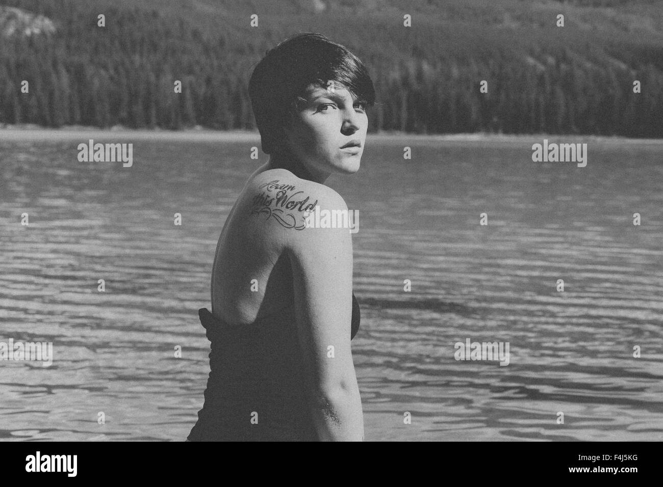 Young beautiful woman traveling in Jasper, Canada in black and white Stock Photo