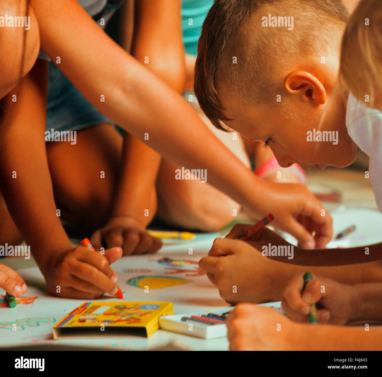 little cute boy with company painting on birthday party Stock Photo Alamy