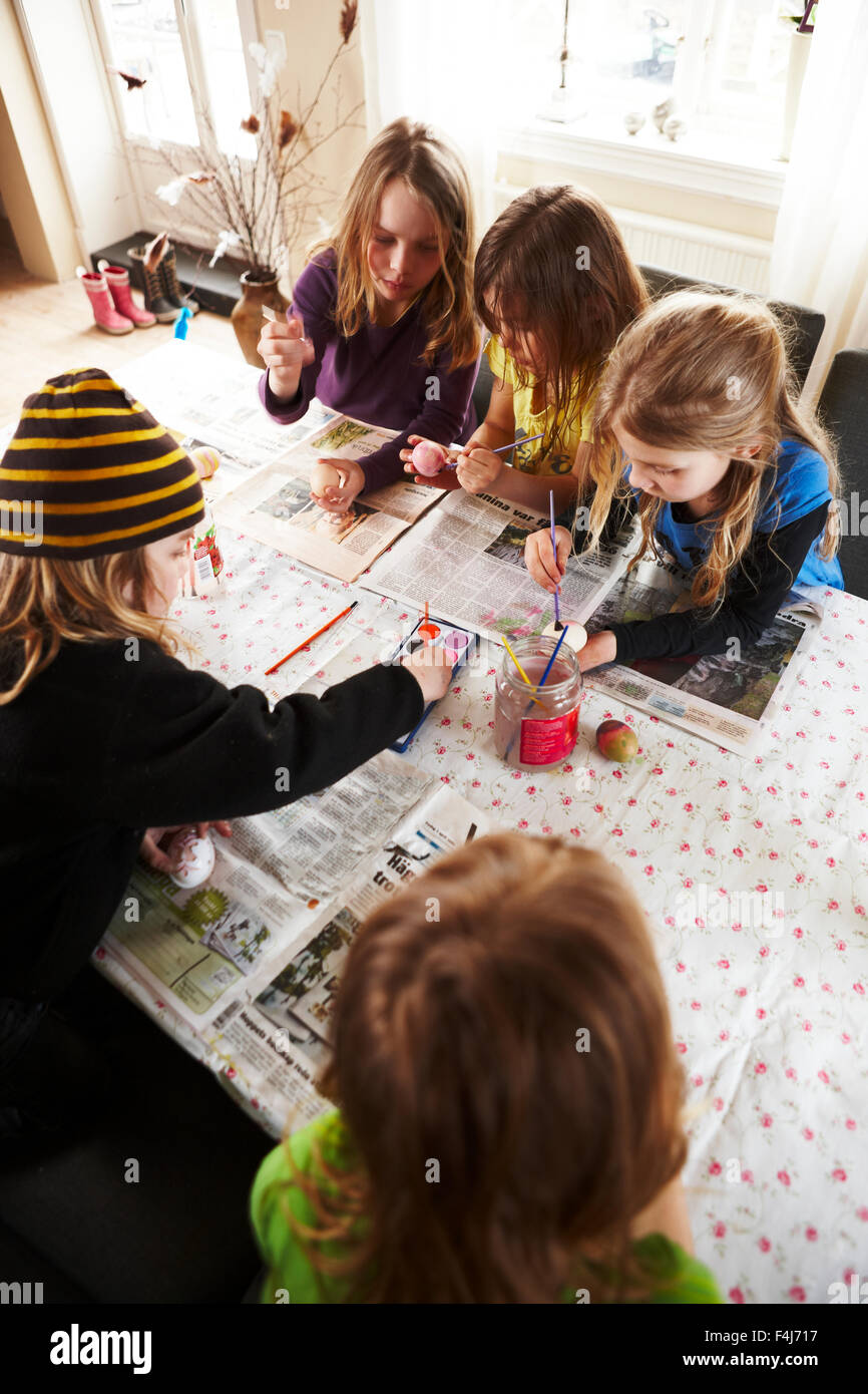 Children painting eggs used as decorations during Lent, Sweden Stock Photo Alamy